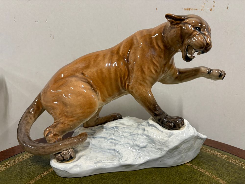 Lot 183:  vintage Beswick porcelain figurine of a puma on a rock, model number 1702.