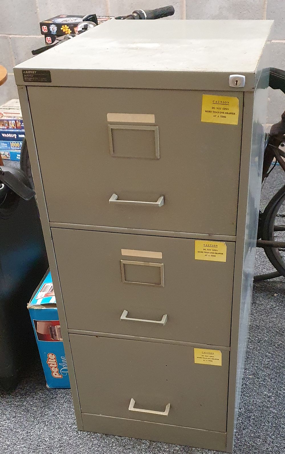Lot 198: Harvey three drawer filing cabinet