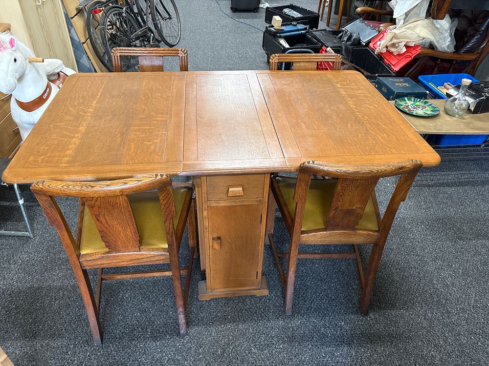 Vintage solid wood drop leaf dining table + 4 Chairs with cupboards and drawers . Space saver 