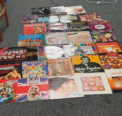 30 LP's and a small selection of singles. Includes culture club , grease , tomita and thats what 