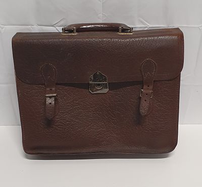 Vintage brown leather satchel . In need of TLC . Stitching come away at the sides