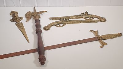 Selection of brass items . Includes pair of wall hanging pistols, 14 " letter opener and others 