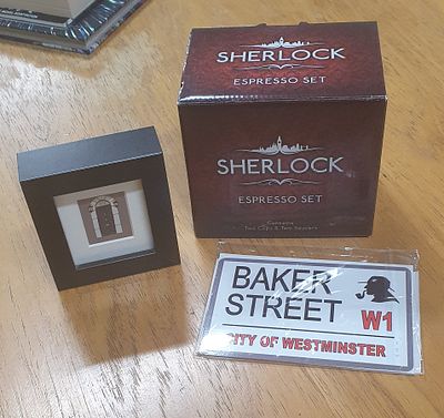 Bundle of Sherlock Holmes items. Includes small picture , small tin plate sign and boxed Espresso set