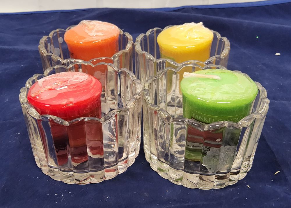 Lot 171: Yankee candle votive holders with candles