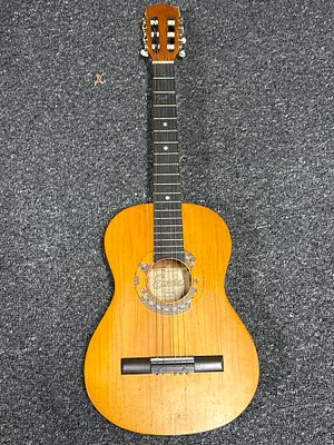 Encore Guitar. As pictured