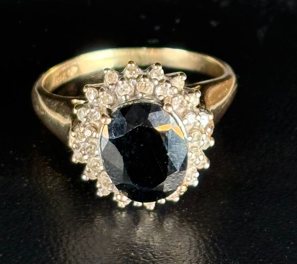 Lot 222: Sapphire and Diamond 14k Gold Ring