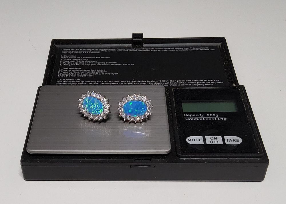 Lot 194: Pair of Silver earings,