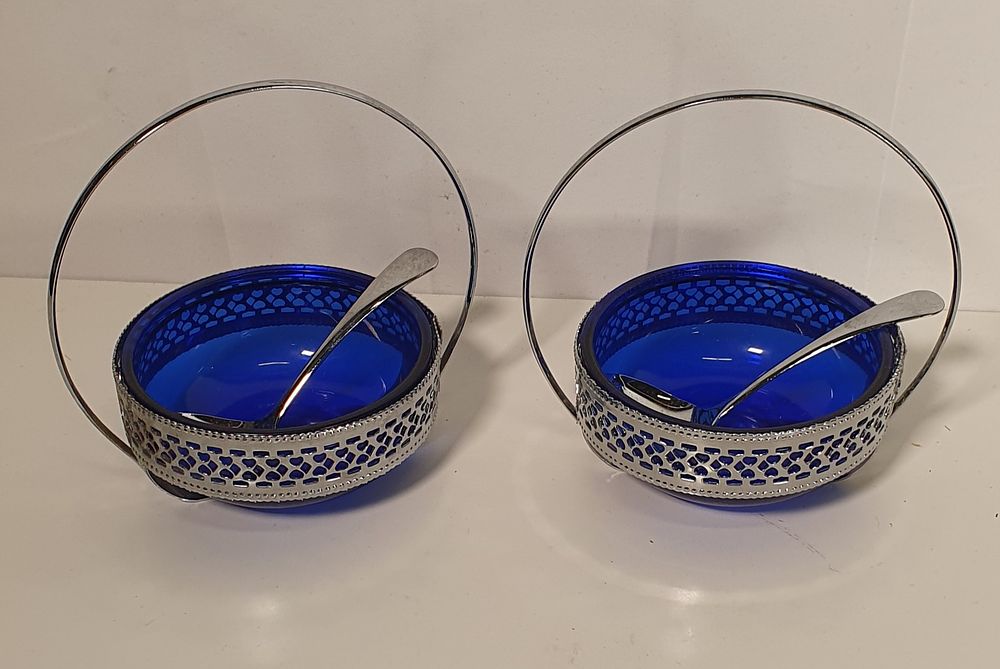 Lot 157: Pair of cobalt blue glass condiment dishes with spoons