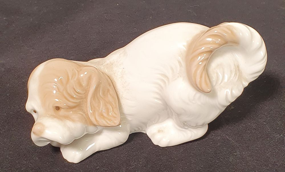 Lot 216: Nao by lladro porcelain dog figurine