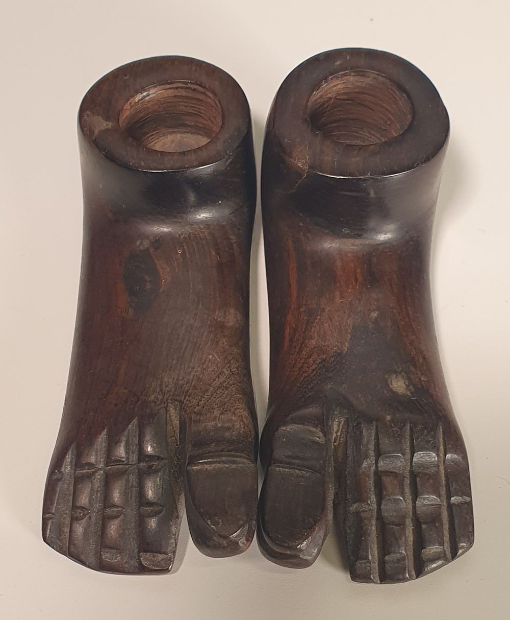 Lot 218: Wooden feet candle holders