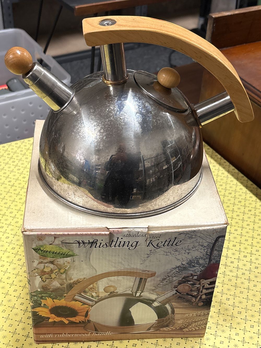 Lot 150: A stovetop whistling Kettle