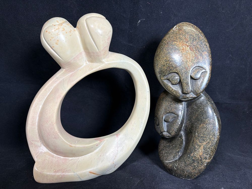 Lot 166: Two Carved Stone Ornaments