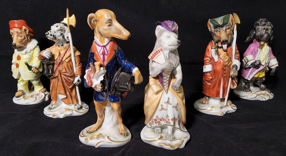 Lot 225: 6 x Utter Weiss Bach Porcelain Dog figures in Various historical attire.