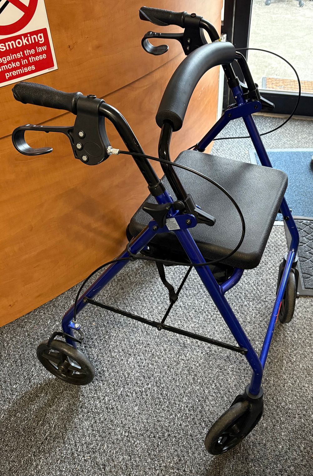 Lot 9a: Walking Aid . Four wheeled with seat