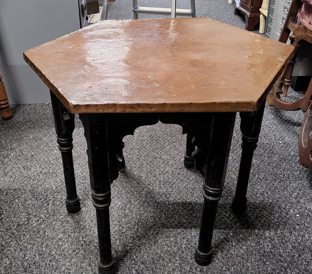 Lot 151: Middle-eastern style Copper-topped hexagon side table.