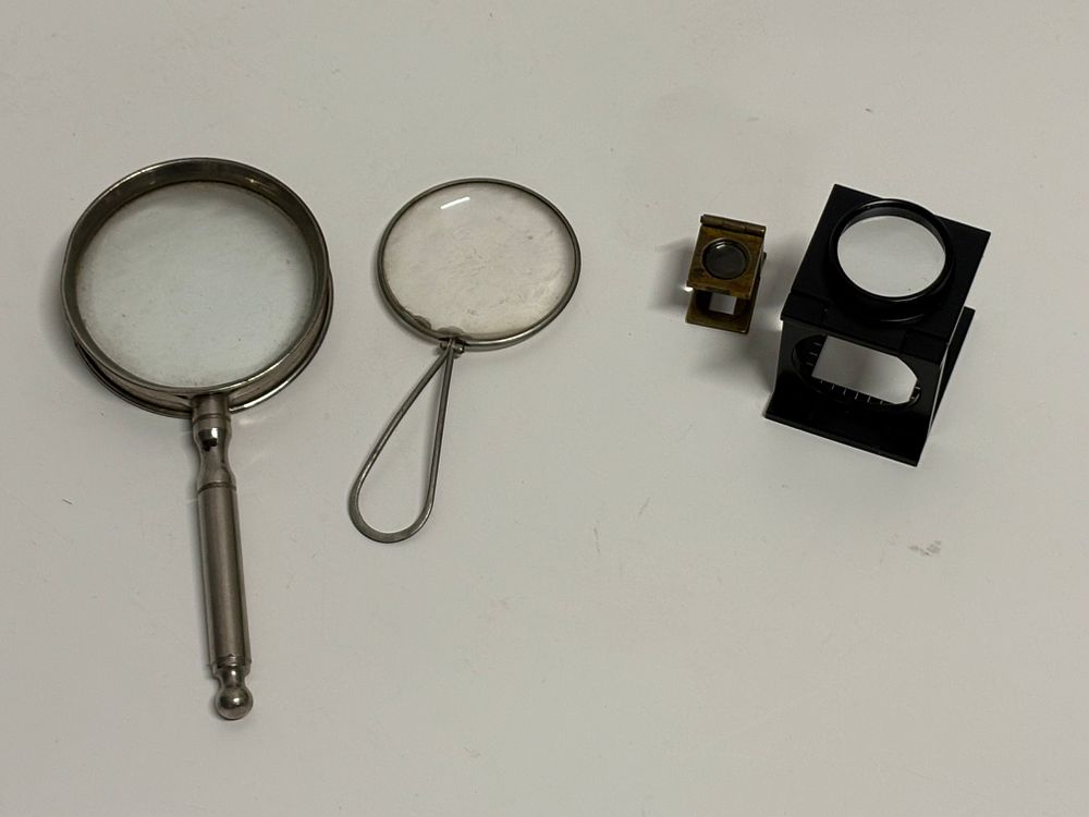 Lot 198c: Two vintage Magnifying Glasses and two weft / thread counters