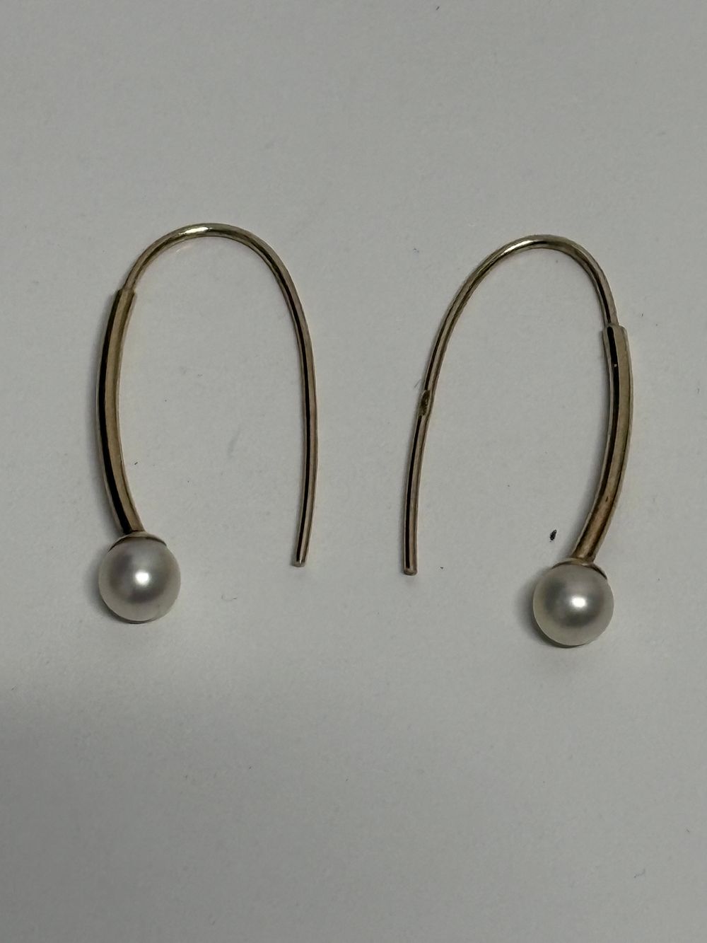 Lot 208: Pair of 9 Carat Gold Earrings