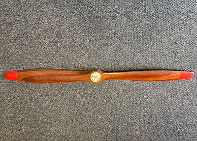 Wooden Propeller with Mounted Clock. 58 inches in length.