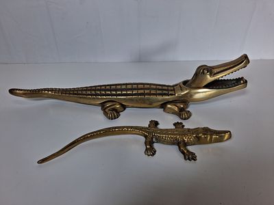 Two brass crocodiles. Larger one is a nutcracker . Weight in total approx 1.5 kg .