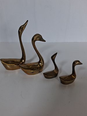 Solid brass swan/duck/ geese figurines. As pictured