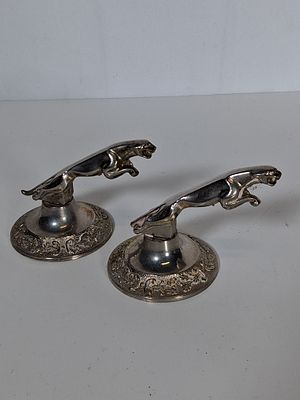 Pair of Jaguar car style "leaping jaguar "mascots/ desk ornaments . . As pictured Approx 3” 