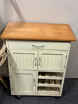 Small Kitchen Unit with Wine Bottle holder . Measures 26.5 x 15 x 33 inches