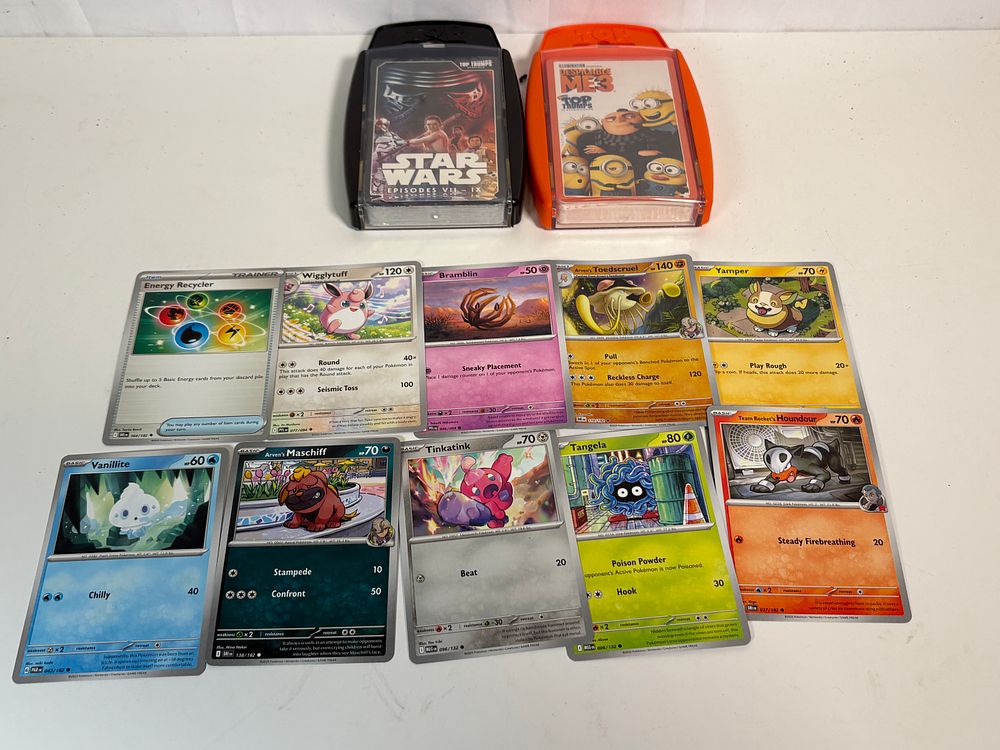 Lot 198: 10 Pokémon Cards and Two Sealed Top Trumps Packs
