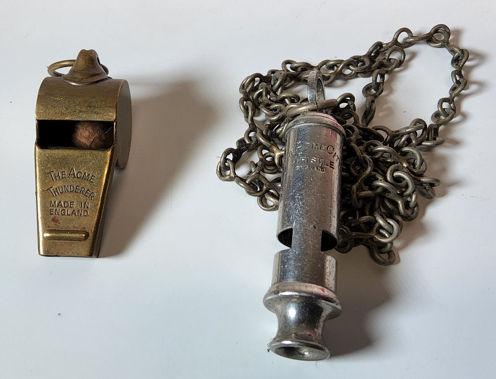 Lot 202: Pair of Vintage whistles .As pictured.