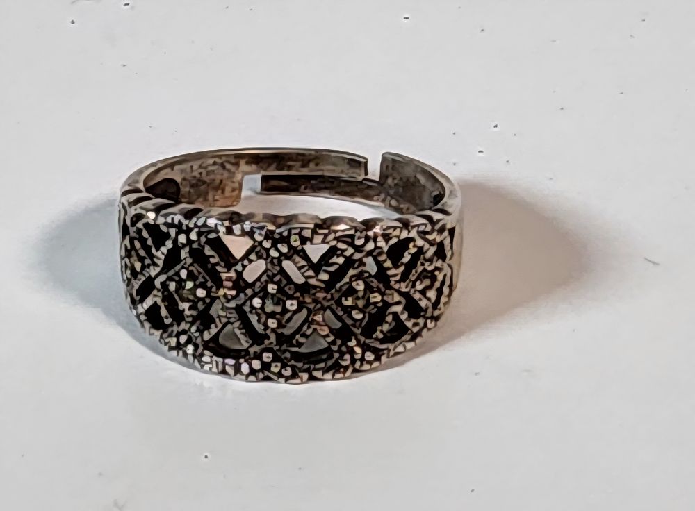 Lot 203: Silver Marcasite Adjustable Ring.