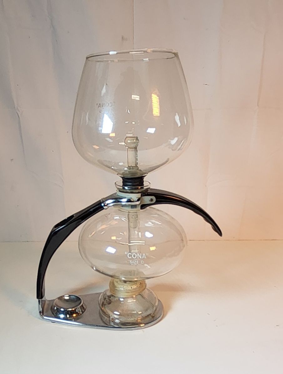 Lot 211: This is a Cona Size D All-Glass vacuum coffee maker. 
PLEASE! Do your research.