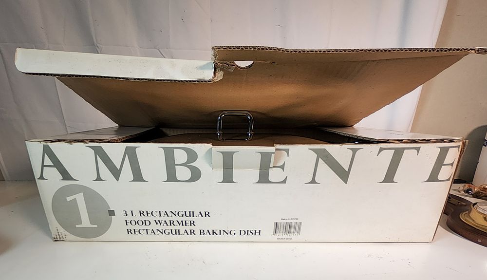 Lot 219: Ambiente' brand rectangular food warmer and baking dish.