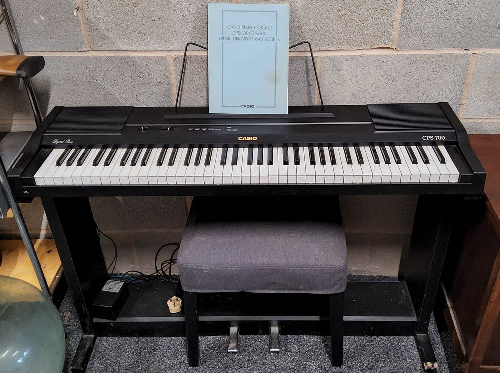 Lot 245: "CASIO" Electric Piano, with stool.