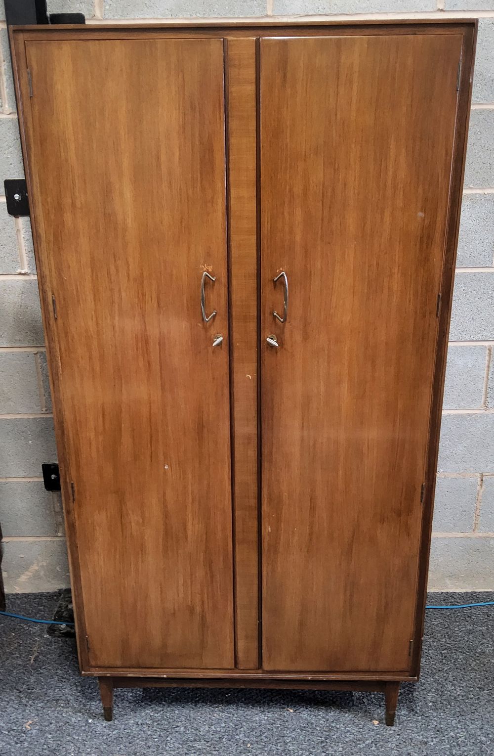 Lot 252: Mid Century Modern "Wrighton" Unit Furniture Gentleman's Wardrobe.
Width 36"
Depth 21"
Height 70".