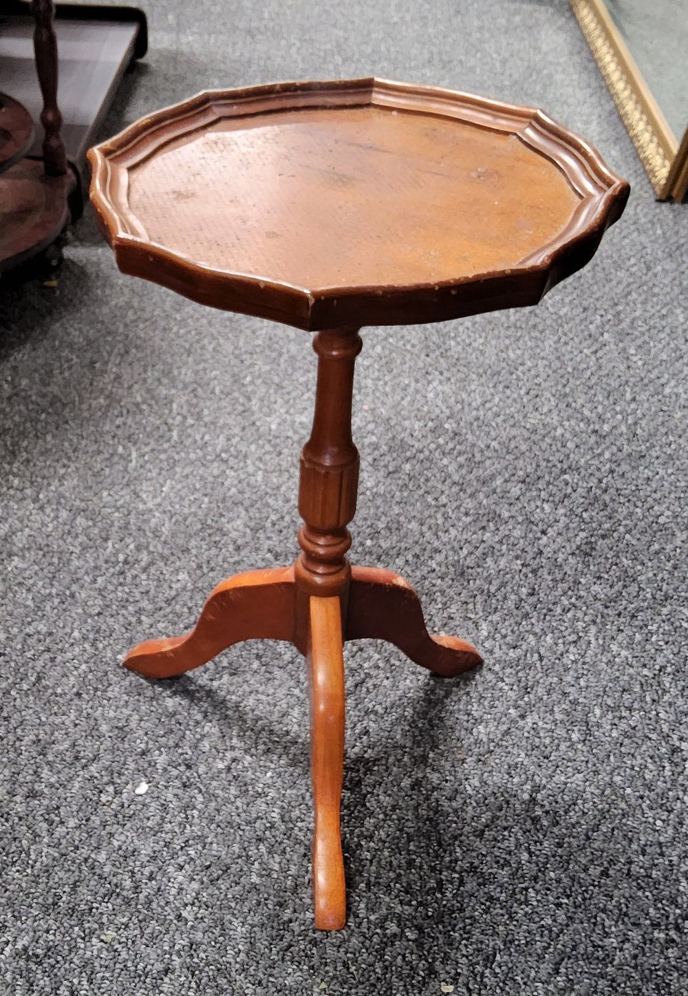 Lot 266: Pie crust edge tripod side table.
13" Diameter.
20" Height.