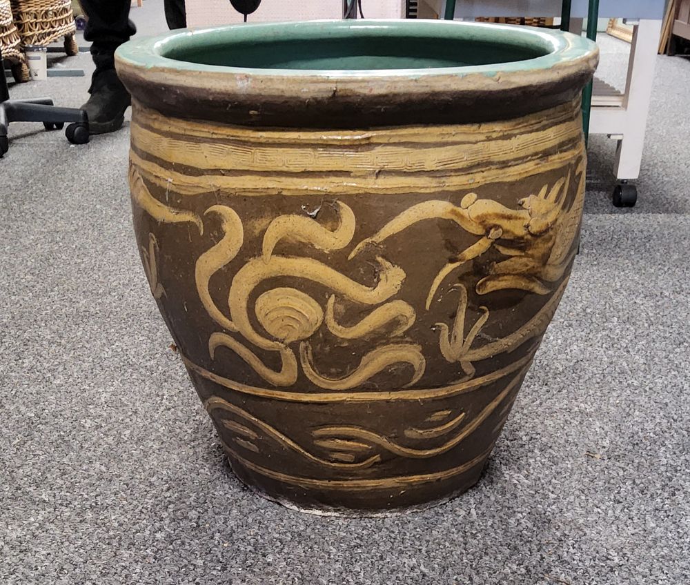 Lot 281: Very large Glazed Terracotta pot.. 
19" Diameter at its
widest point .
17" Height.