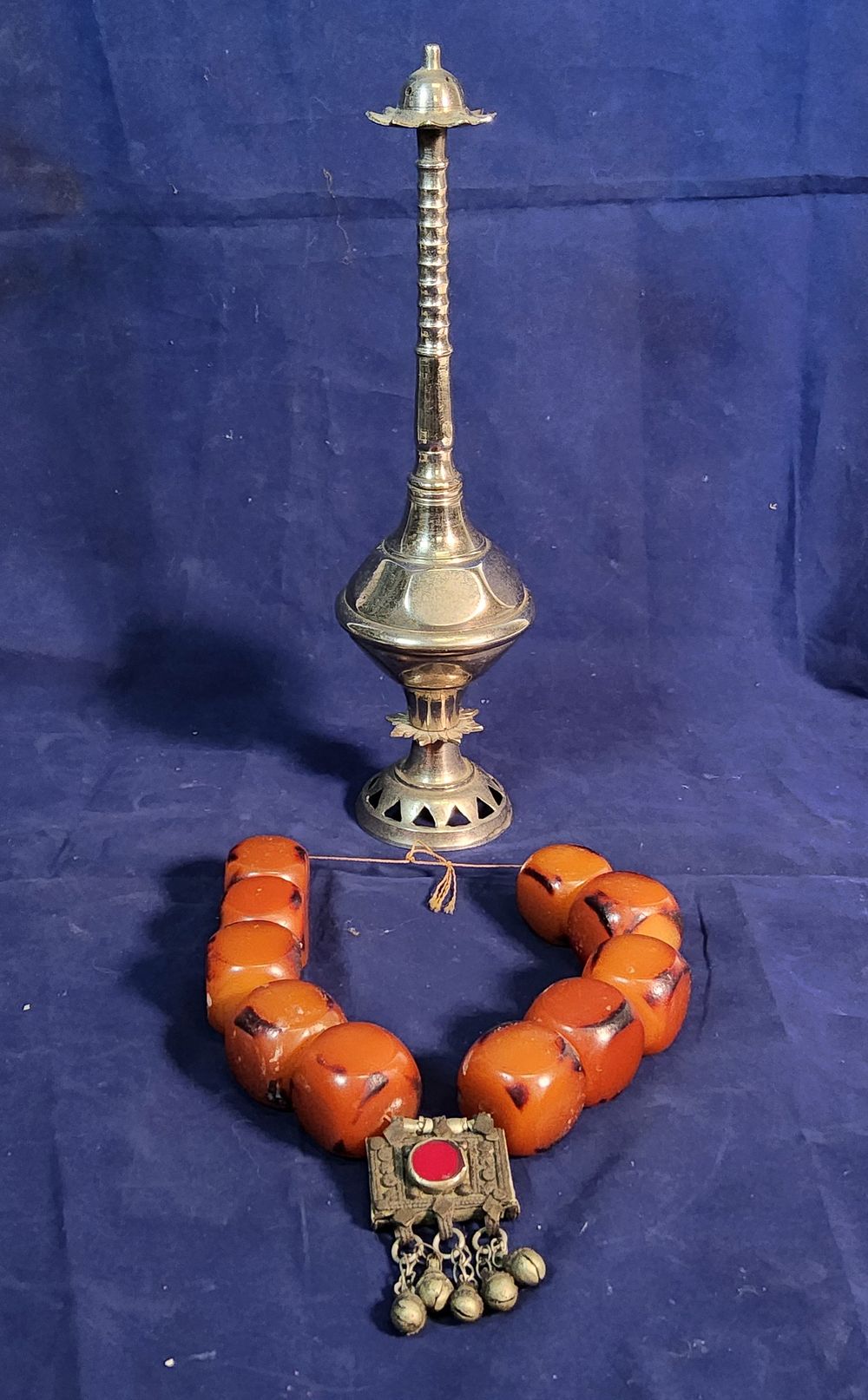 Lot 205a: Vintage metal rose water sprinkler plus 
 Large Bead Middle Eastern necklace.