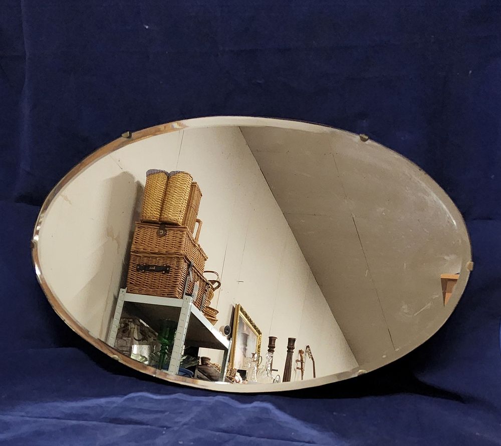 Lot 115a: Vintage Oval frameless bevelled mirror. 