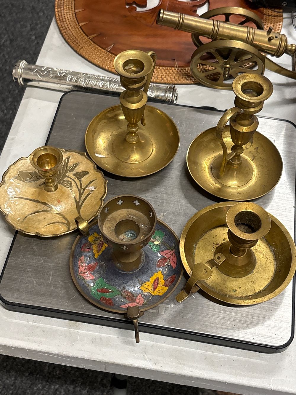 Lot 149: Five Brass Candle Holders