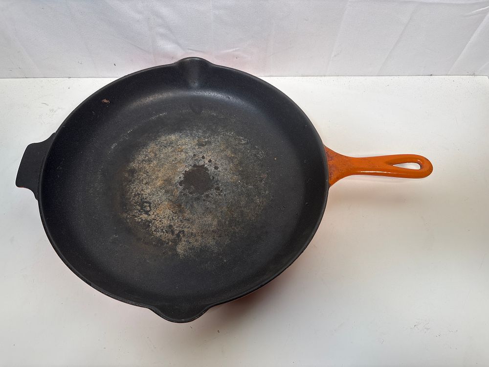 Lot 184: Large well used Le Creuset 30cm frying pan