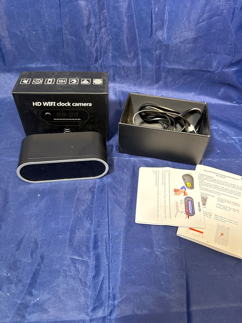 Lot 258: Boxed New Hidden WiFi alarm Clock Camera