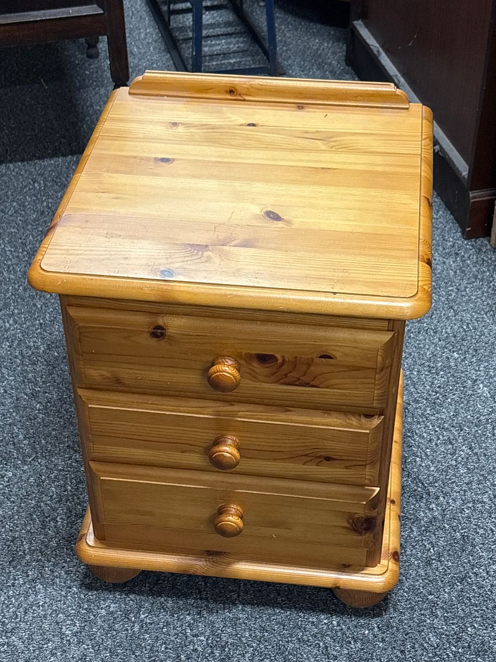 Lot 410: Pine 3 Drawer Bedside Cabinet