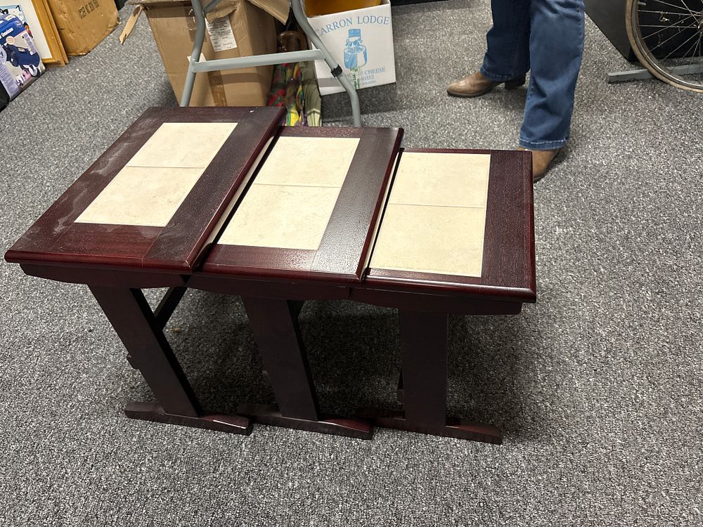 Lot 414: Nest of 3 Tile topped tables