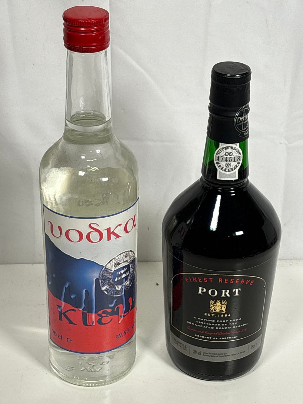 Lot 100: Bottle of Vodka Kiev 70cl and a Bottle of Finest Reserve Port