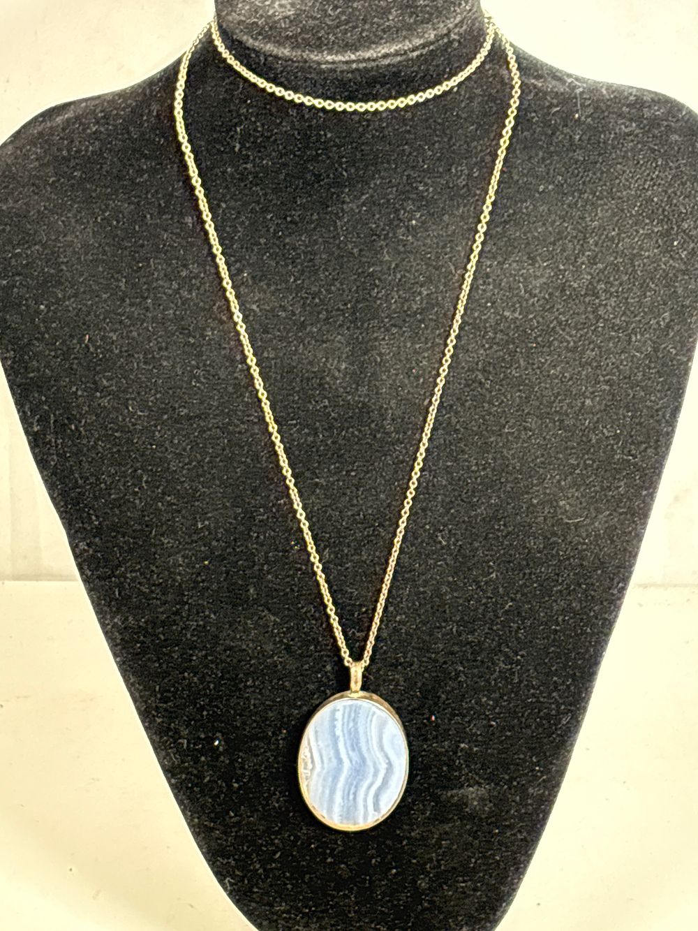 Lot 209: Sterling Silver Chain and Large Blue Lace Agate Pendant