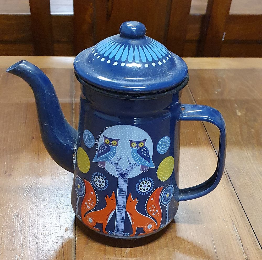 Lot 239: Dark Blue enamel folklore coffee pot