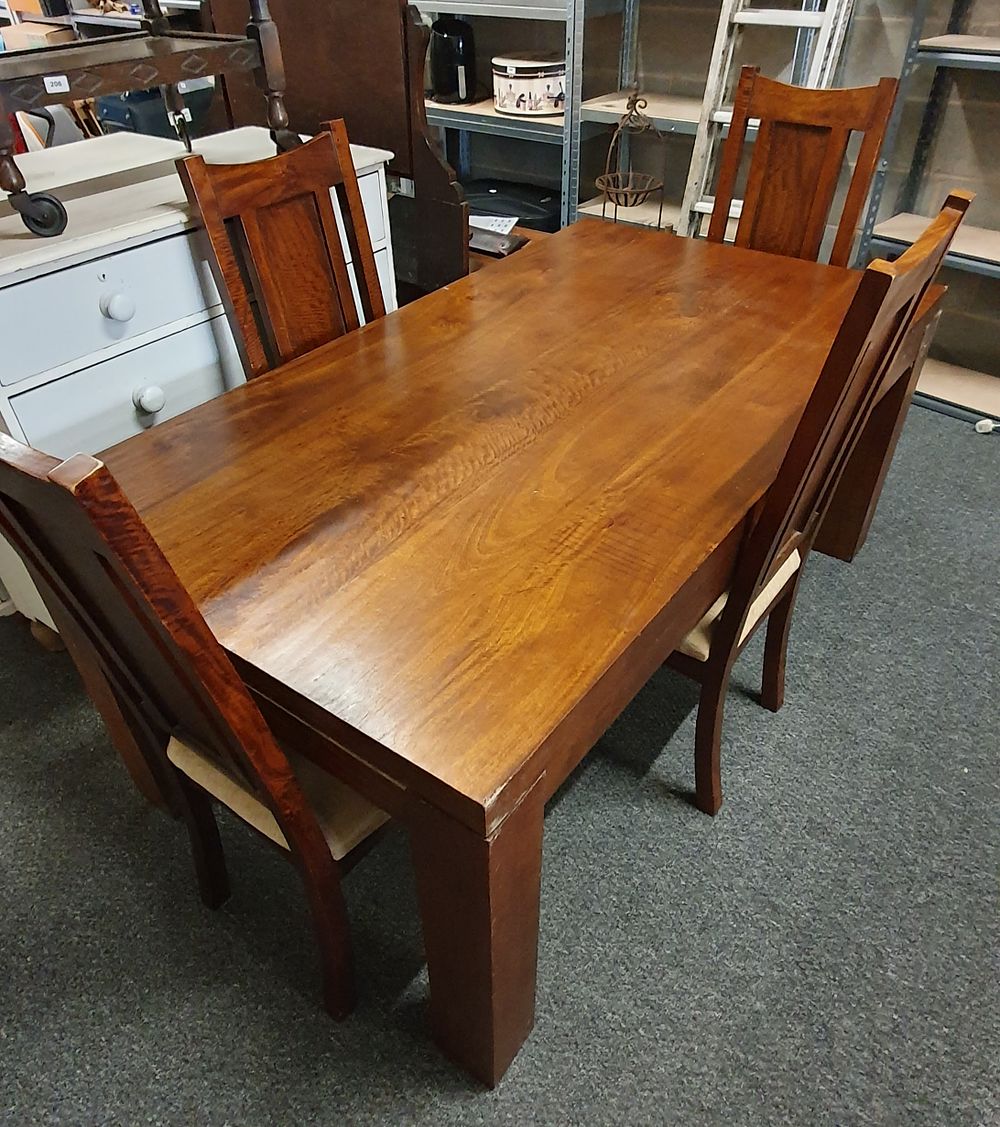 Lot 248: Solid wood dining table and four chairs.