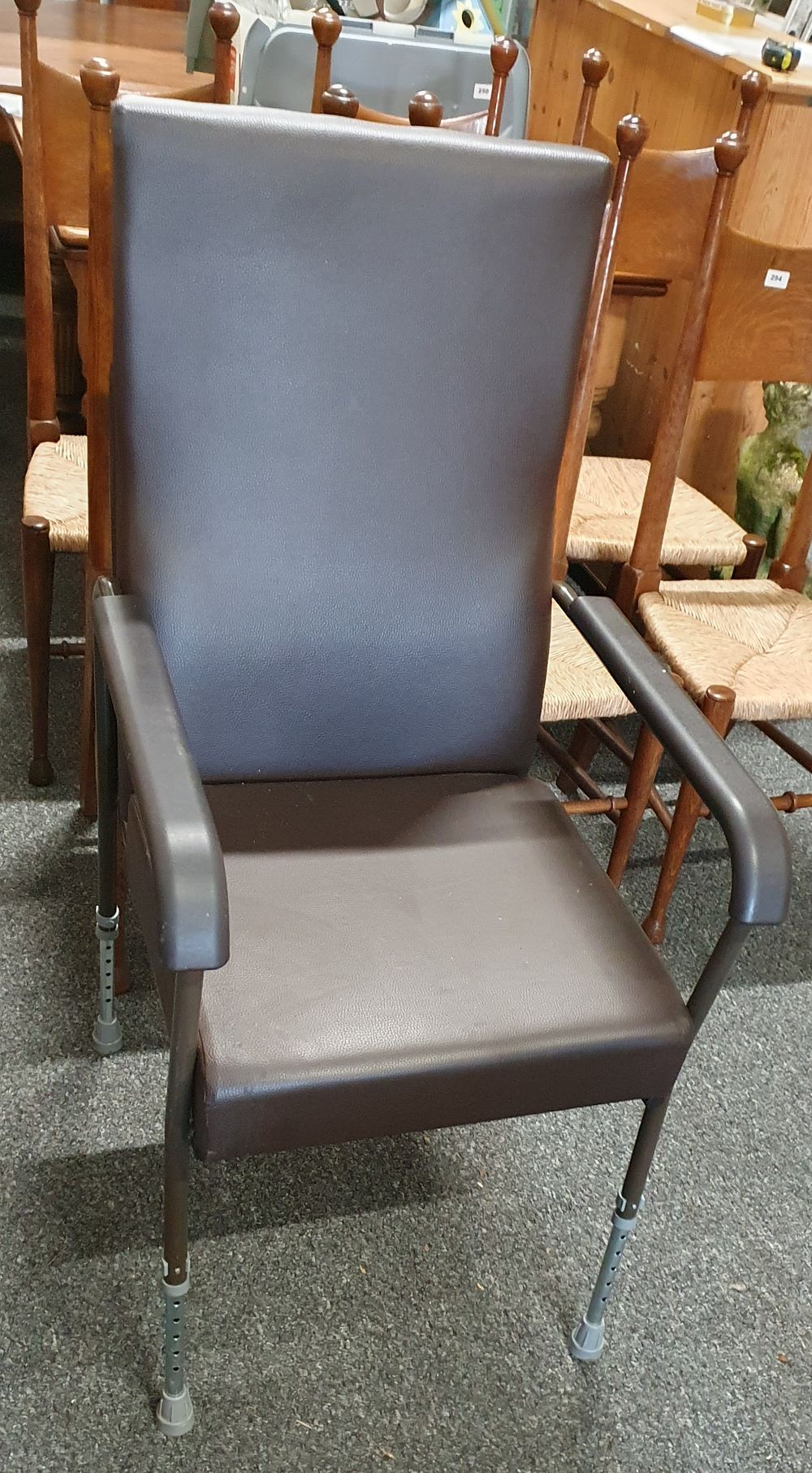 Lot 256: Height adjustable high back chair.