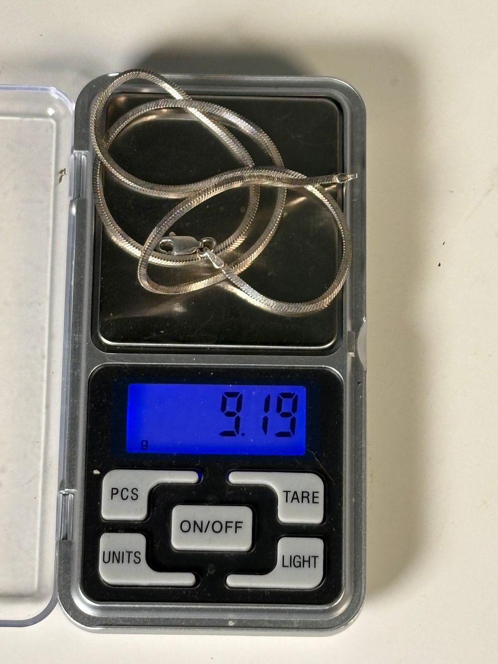 Lot 189: Sixteen Inch, Square Sterling Silver Chain