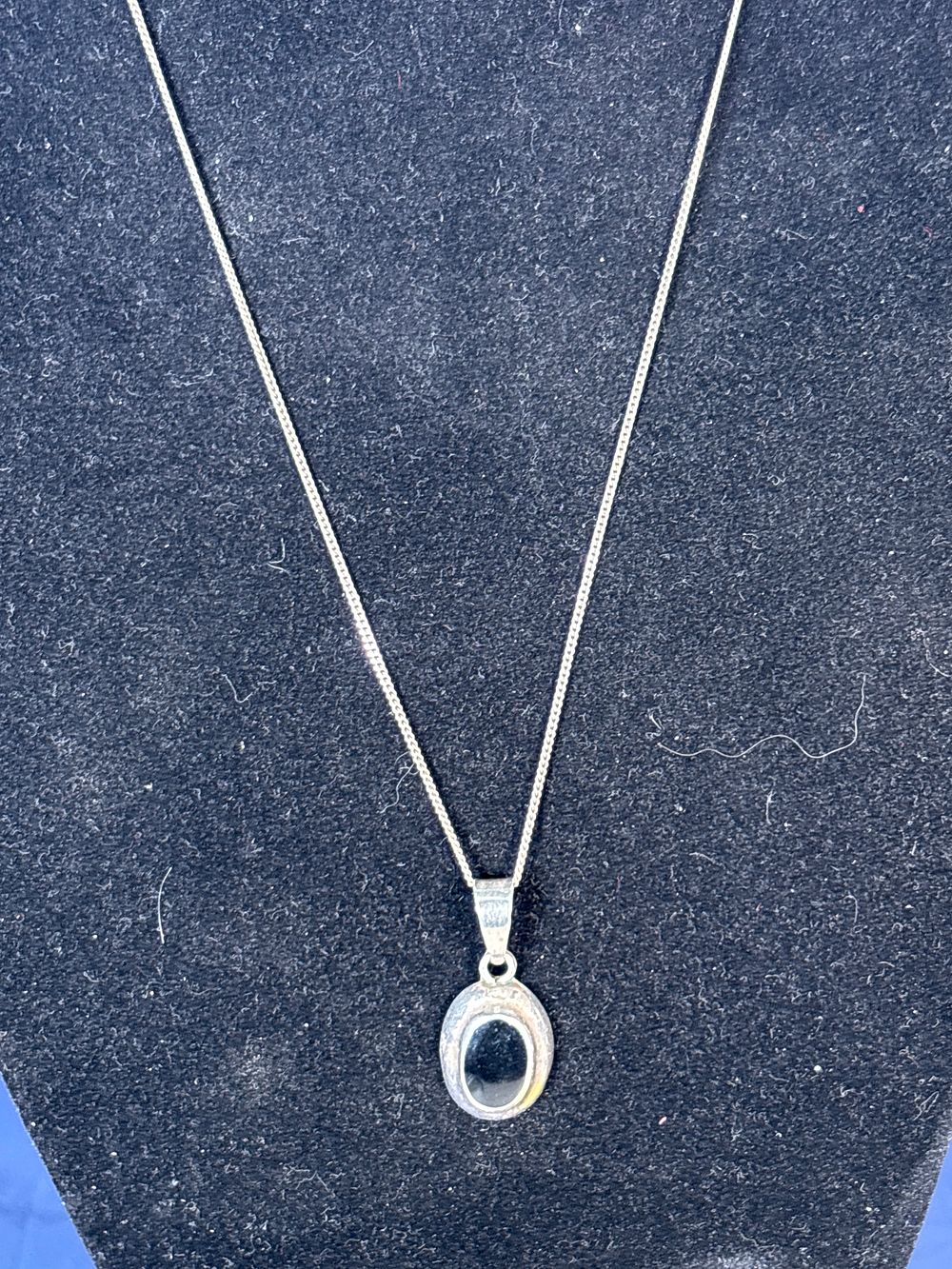 Lot 197: Sterling Silver 18” Chain with Mexican Silver Pendant