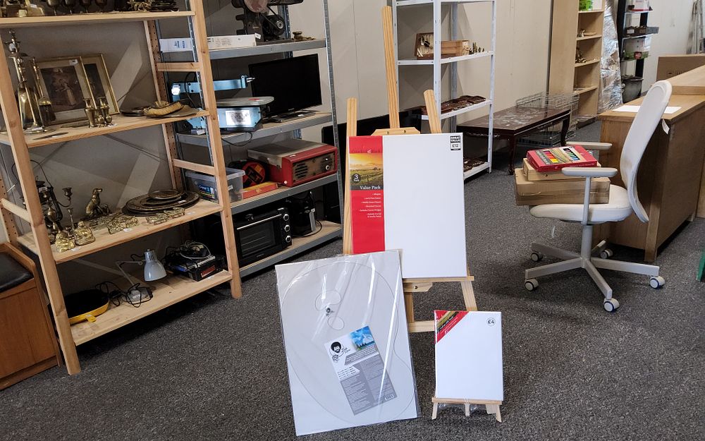 Lot 244: Easel with canvas